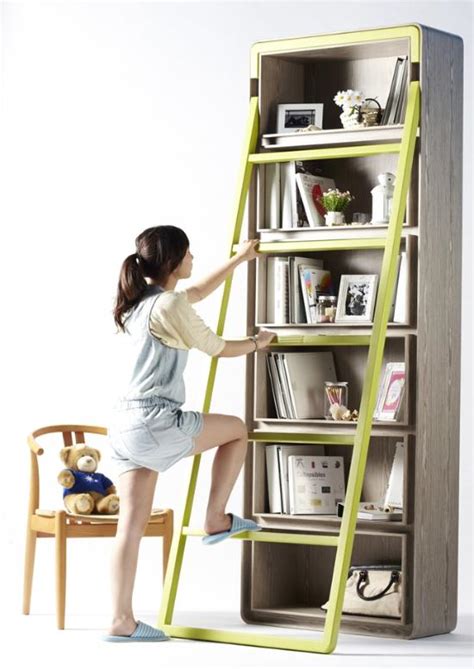 开放式书柜充分结合考虑孩子和大人的特性，高低分层，分别放置童书和成人书籍，方便取阅、归放。家庭图书馆-家居美图_装一网装修效果图