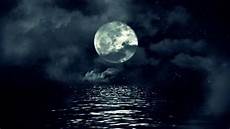 Moon And Clouds Photo by Moon Above Water With Clouds Royalty Free Footage Moon And Clouds Photo
