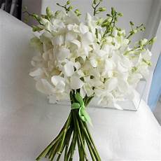 Orchid Wedding Flower Arrangements by An Orchid Bouquet Or Basket Is Popular With Summer Orchid Wedding Flower Arrangements