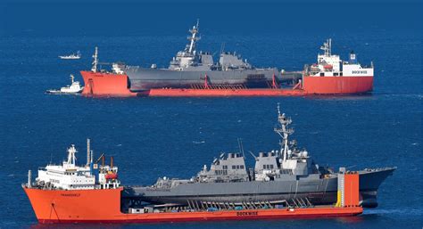 USS John S. McCain loaded on Heavy Load Carrier arrives while USS ...