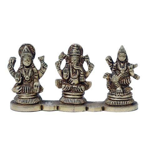Brass Murti Goddess Lakshmi, Lord Ganesha And Goddess Saraswati Is Sit ...