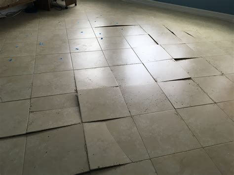 How To Repair Loose Floor Tiles | Storables