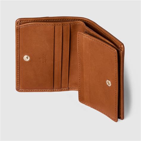 GG Emblem small wallet in beige and dark brown fabric | GUCCI® UK