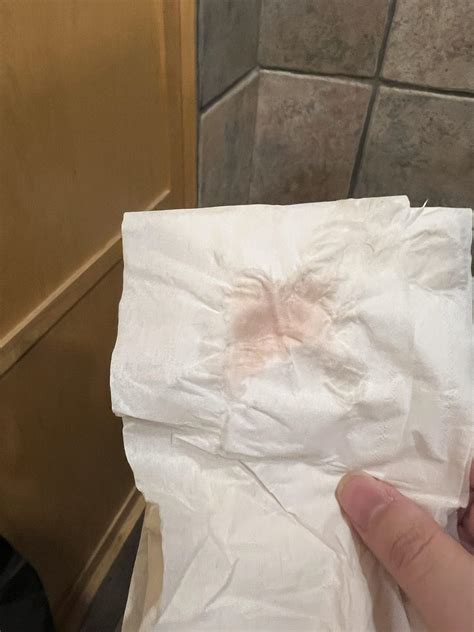 Pinkish Blood On Toilet Paper