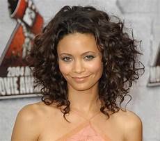 Hairstyles For With Thick Curly Hair by Best Medium Length Hairstyles For Thick Hair Circletrest Hairstyles For With Thick Curly Hair