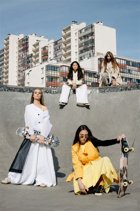Woman in Cap Holding Skateboard · Free Stock Photo