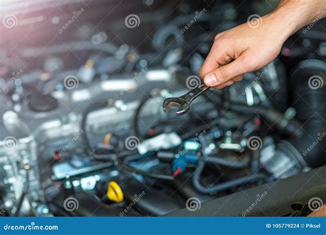 Mechanic Working on Car Engine in Auto Repair Shop Stock Photo - Image of fixing, industry ...
