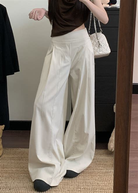 Shop Off White High Waist Pleated Baggy Pant - for Women | OUTZIDR ...