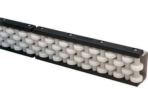 CONVEYOR SIDE GUIDE - UHMWPE ROLLER GUIDE Manufacturer from Ahmedabad