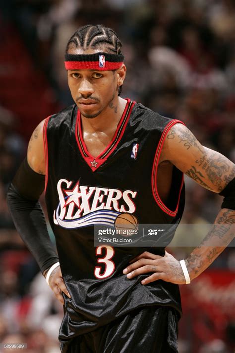 Allen Iverson of the Philadelphia 76ers looks on against the Miami ...