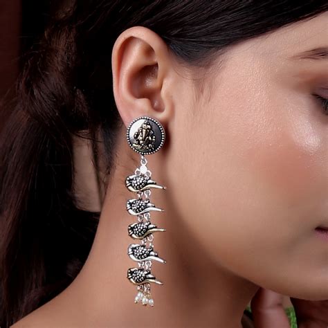 Tranquil Ganpati Long Earrings in Dual Tone – Cippele
