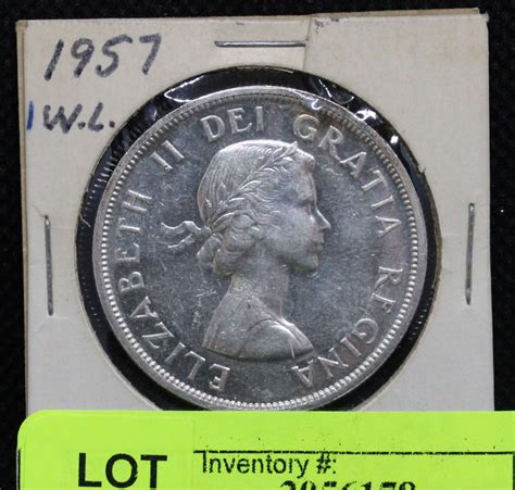 1957 CANADA SILVER DOLLAR COIN