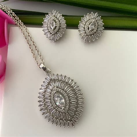 Salvanity American Diamond Pendant Set with earrings - Netra - White D