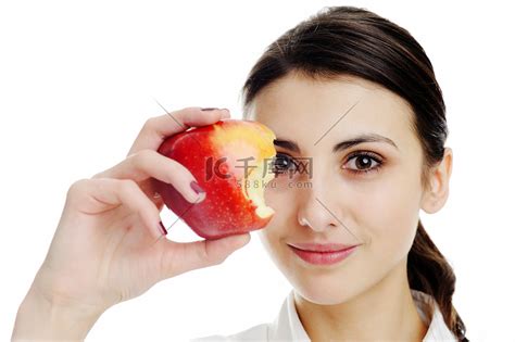 拿着苹果的好女人高清摄影大图-千库网
