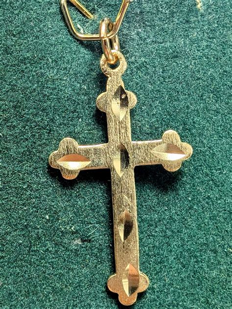 10K Yellow Gold 0.87G Cross Pendant, Suggested Retail Value $340