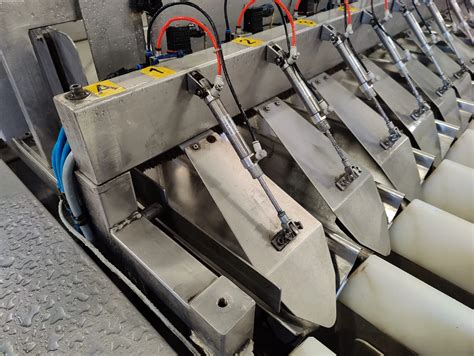 Two S&B weighing machines with two Affeldt clippers and two Ishida ...