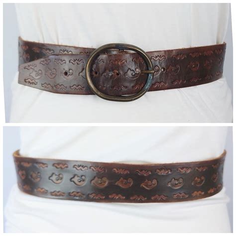 Women's wide embossed brown leather vintage belt. •... - Depop