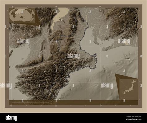 Mie, prefecture of Japan. Elevation map colored in sepia tones with lakes and rivers. Corner ...