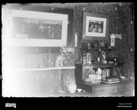 Scene of one wall inside a home with desk and pictures , Interiors ...