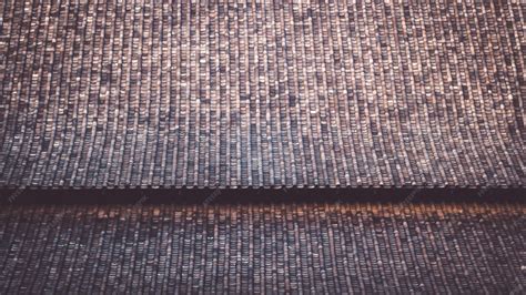 As telhas chinesas com design curvo. O telhado de argila de um templo ...