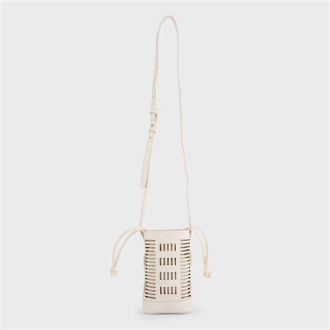 Buy IYKYK by Nykaa Fashion Off White Cutwork Vertical Sling Bag with ...