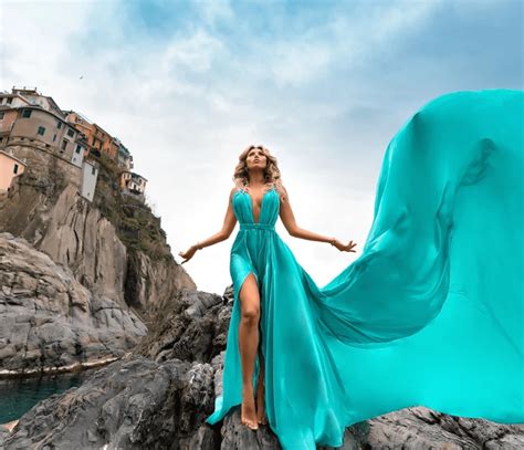 Where are Greek white houses with blue roofs? Santorini, Greece.