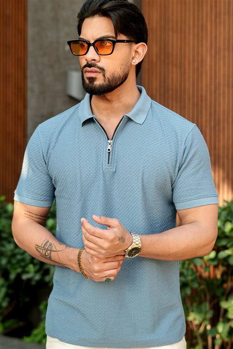 Gritstones Blue Self Design Zipper Polo Collar T-Shirt