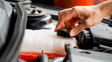 How much coolant should be in the reservoir? | REREV