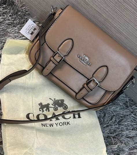 Coac h Lucy Crossbody In Signature Canvas With folding box 251