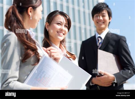 Business People Smiling Stock Photo 的图像结果