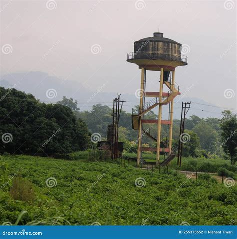 Big water tank stock photo. Image of grass, column, field - 255375652