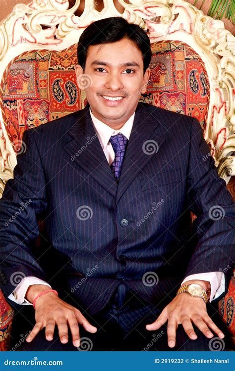 Suit Man Sitting 的图像结果