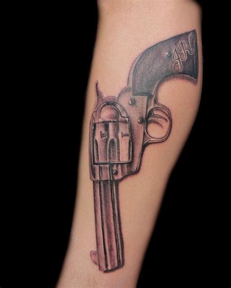 Image result for Revolver Tattoo