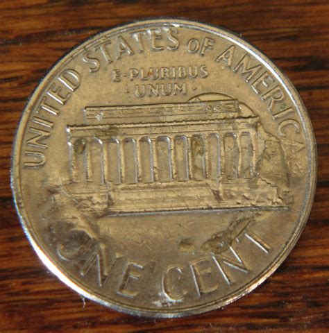 I have what appears to be a silver or chrome plated penny, dated 1976 ...