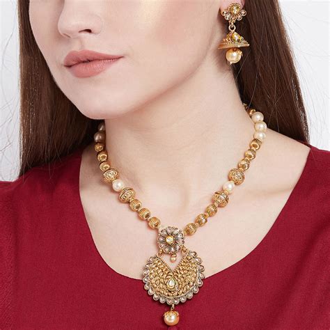 Buy PANASH Women Gold-Plated Stone Pearl Studded Jewellery Set Online