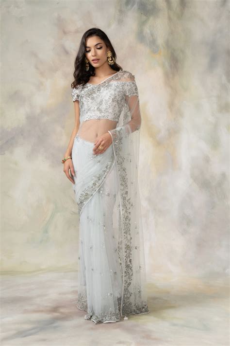 Light Blue Net Saree With An Off Shouldered Blouse – Pooja Peshoria