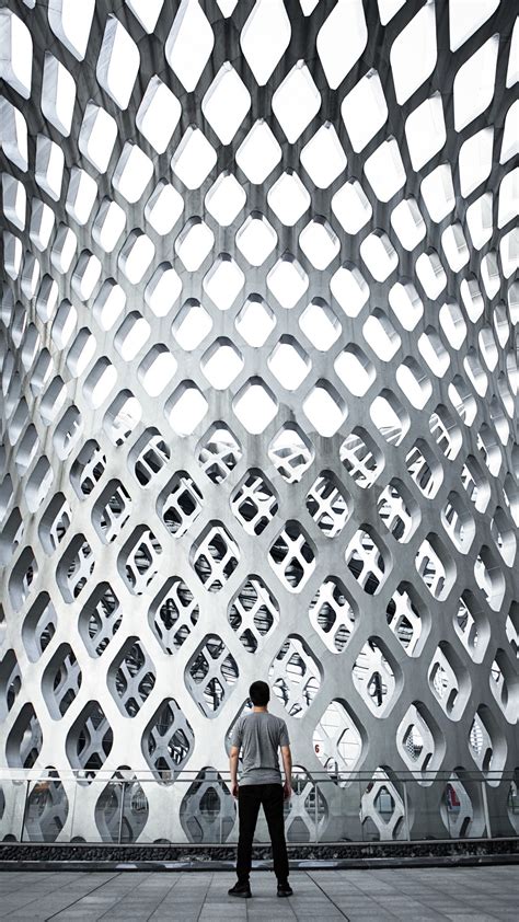 Download wallpaper 1080x1920 man, architecture, column, grid, design ...