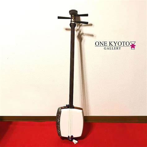 Image result for Three String Instrument