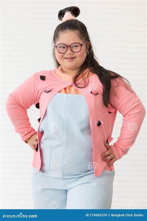 Portrait of Beautiful and Cute Teen Asian Down Syndrome Girl Posing As ...