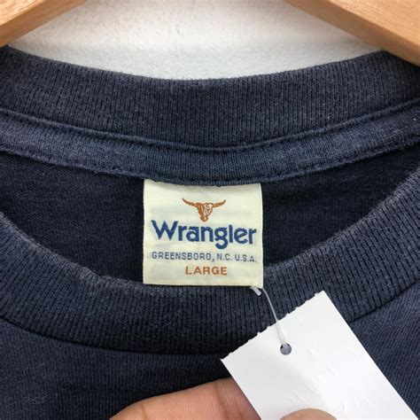 Vintage Wrangler T Shirt Tag: Wrangler. Size on... - Depop