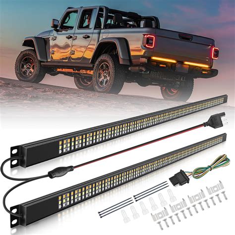 Nilight Truck Tailgate Light Bar 56" Aluminum Frame Triple Row 576 LED Strip with Red Running ...