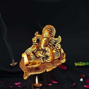 NOKTUS Metal Ganesh Idol on Leaf | Lord Ganesha with Diya for Diwali ...