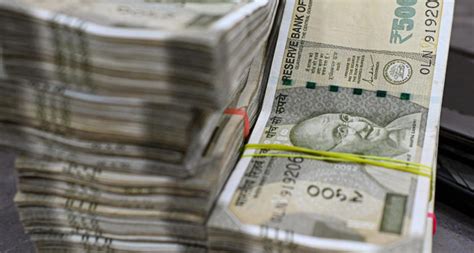 Rupee falls to new record low of 88.18 against USD
