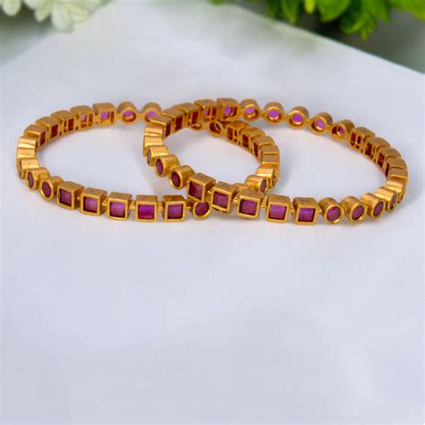 Alluring Matte Gold Plated Ruby Stone Bangles Buy Online | KSupreme – K ...