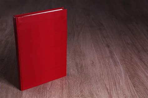 Blank book on wooden background | Premium Photo