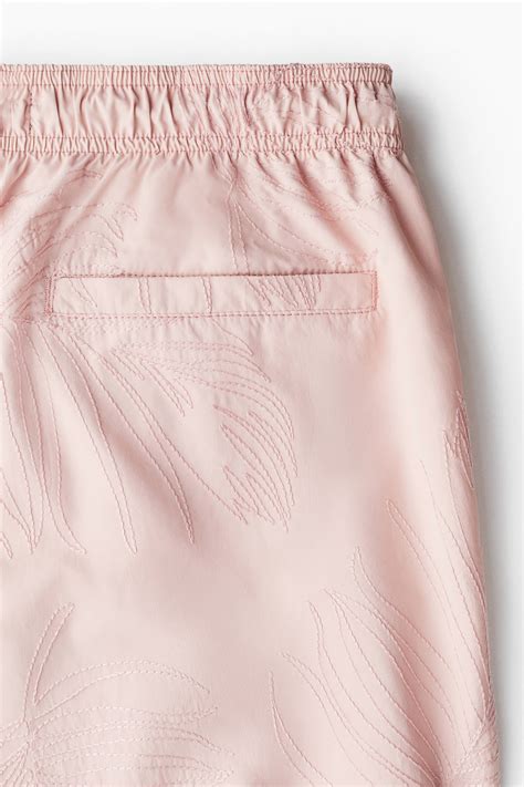 Patterned swim shorts - Pink/Leaf-patterned - Men | H&M IN