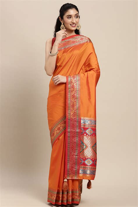 Graceful Orange Solid Saree Highlighted With Floral Zari Weaving On Si