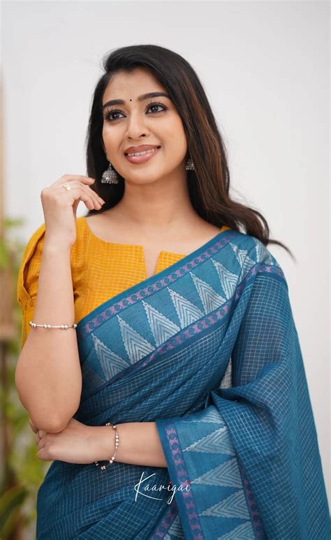 Saaral Peacock Blue shade and Mustard tone Sungudi Saree – Ivalinmabia