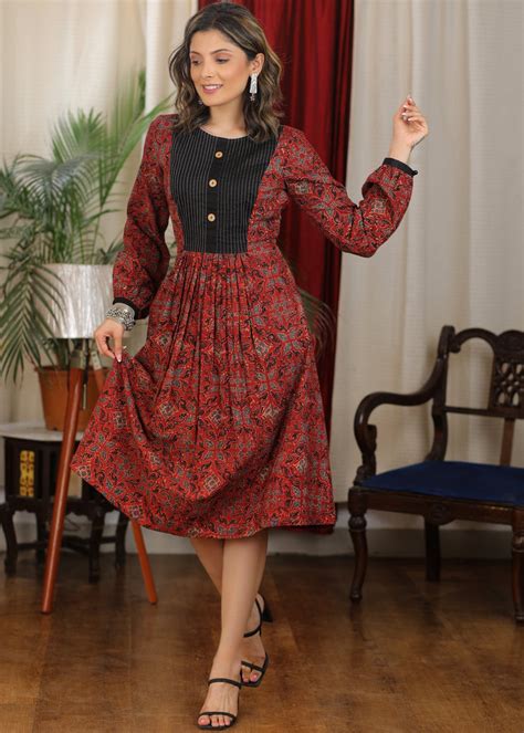 Exclusive maroon ajrakh full sleeve combination dress with black pintu ...