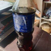 [Resolved] Pepsico India — Pepsi 400ml Tilt cap & damaged label